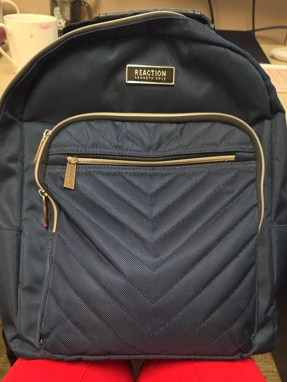Kenneth Cole Reaction Navy Quilted Front Pocket Backpack with Gold Accents